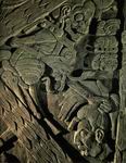 На барельефе в городе Тонина (Мексика) изображен скелет (справа), ухвативший за волосы отрубленную голову человека