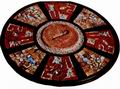 Мозаичный диск из бирюзы, раковины и кремня - один из многочисленных предметов, найденных в 'Священном сеноте' Чичен-Ицы
