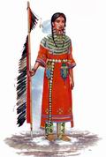Девушка-воин племени сиу-тетон со знаменем общества Храбрых сердец, 1860-1890 гг.